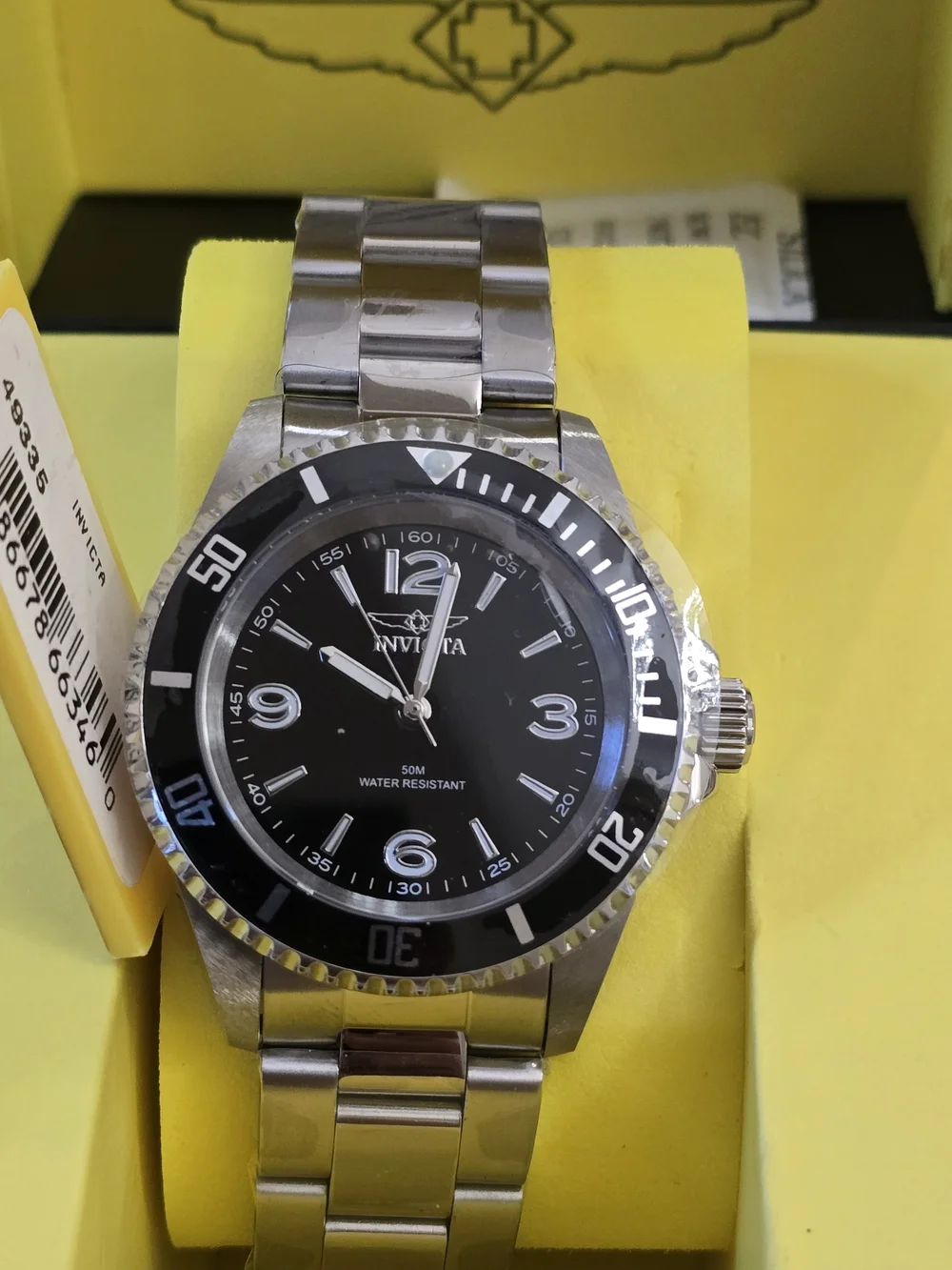 Invicta Silver Stainless Steel Watch with Black Dial and Bezel
